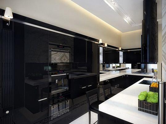 Blankt svart kök i en klassisk kombination med en snövit bänkskiva